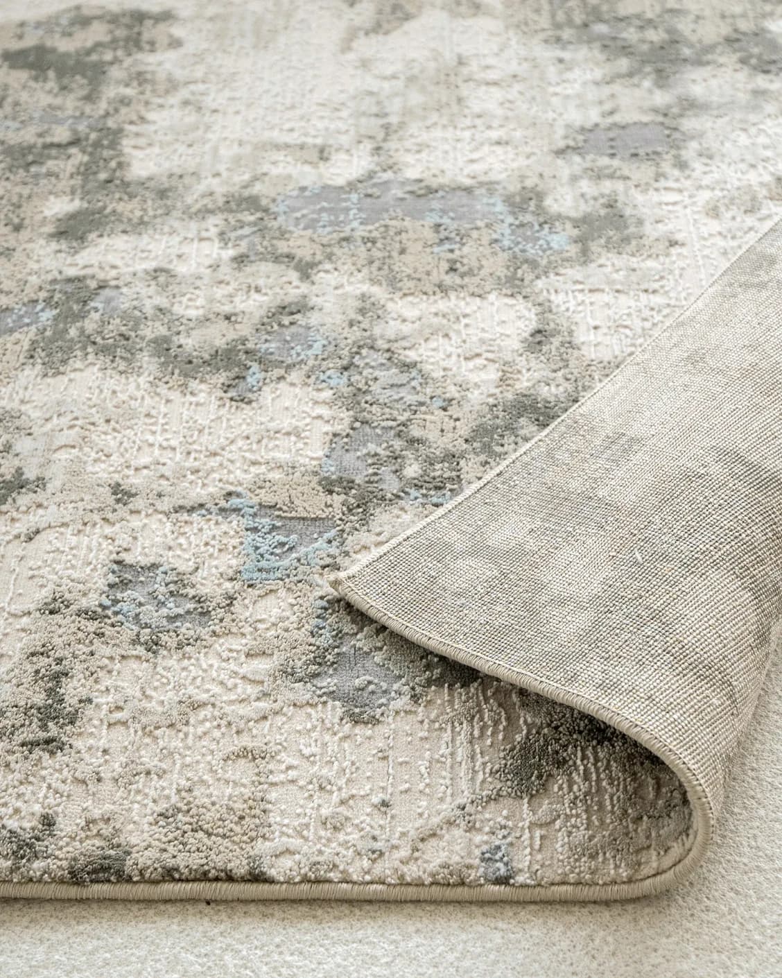 Cooper Sky carpet in sky, blue and grey, shown in a product close-up as image 14