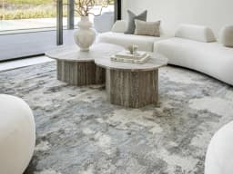 Cooper Sky carpet in sky, blue and grey, shown in a lifestyle front view