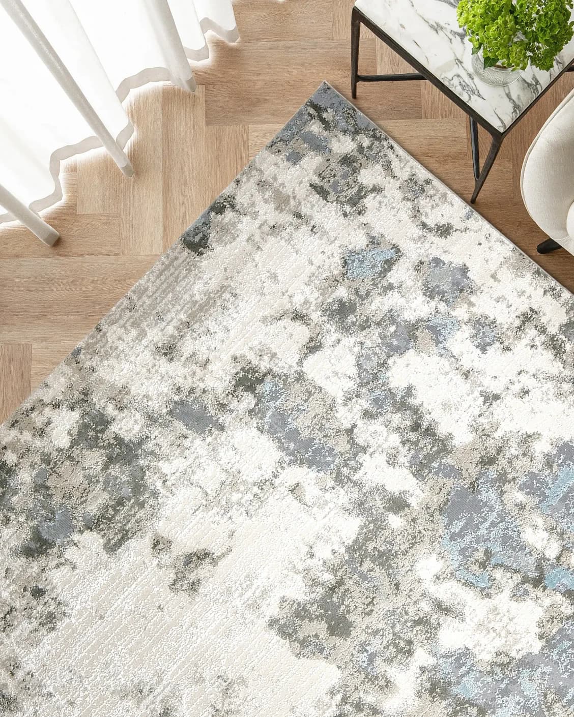 Cooper Sky carpet in sky, blue and grey, shown in a lifestyle top view as image 2