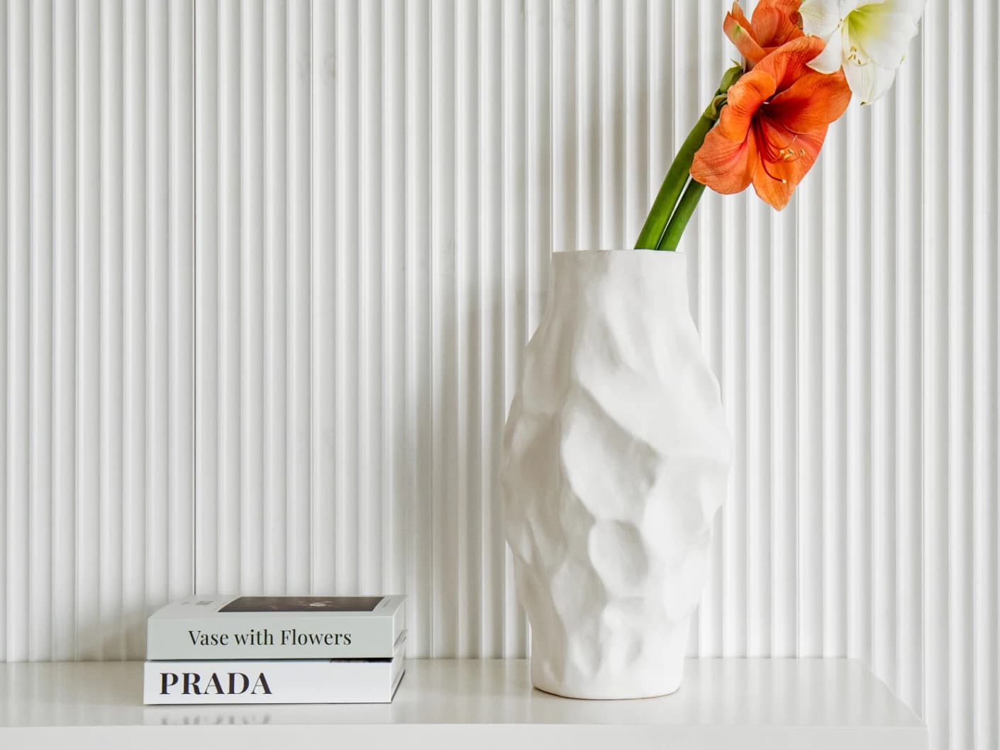 Cora Arneson vases in white, shown in a lifestyle front view