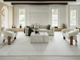 Corvin Sandy carpet in sandy, ivory and grey, shown in a lifestyle front view