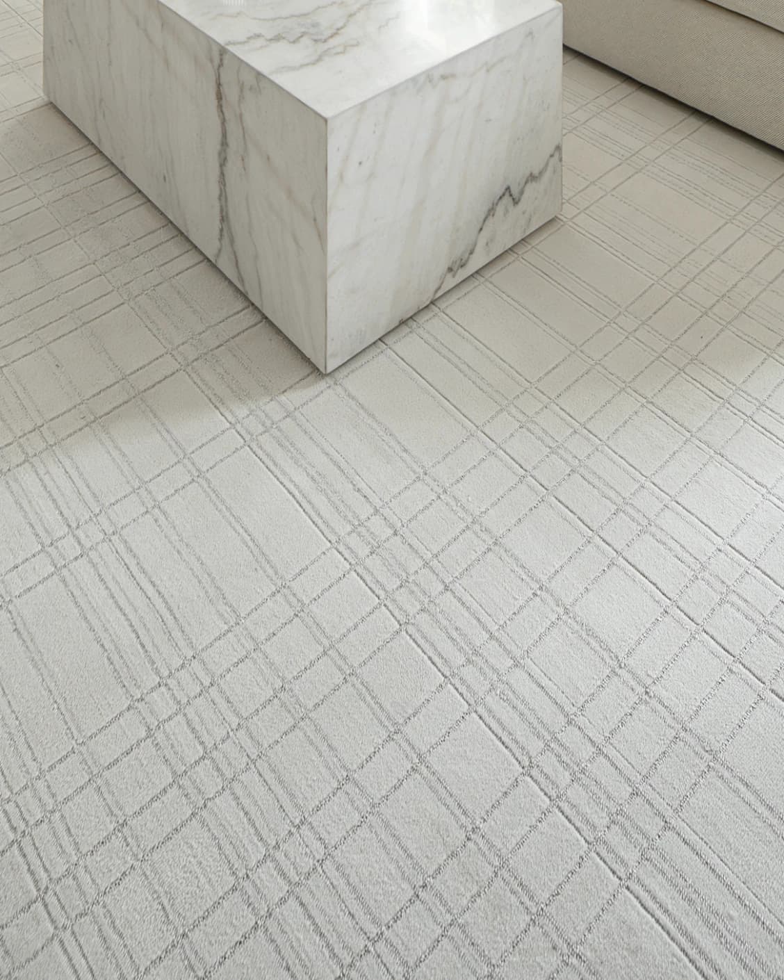 Corvin Sandy carpet in ivory and grey, shown in a lifestyle close-up as image 4