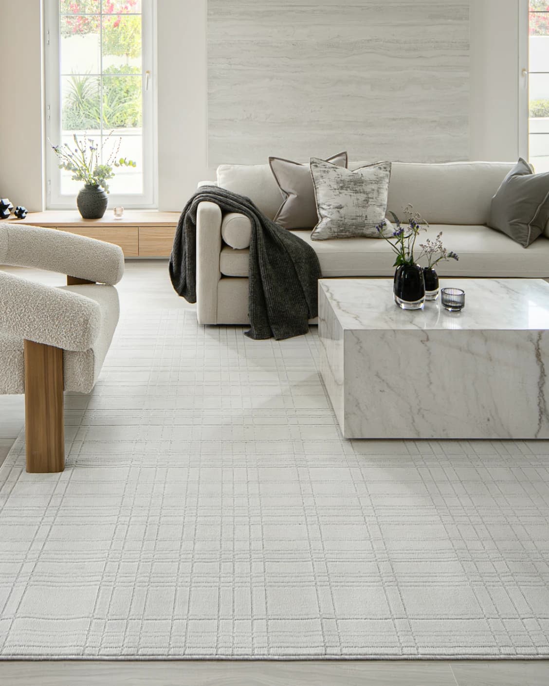 Corvin Sandy carpet in ivory and grey, shown in a lifestyle front view as image 7