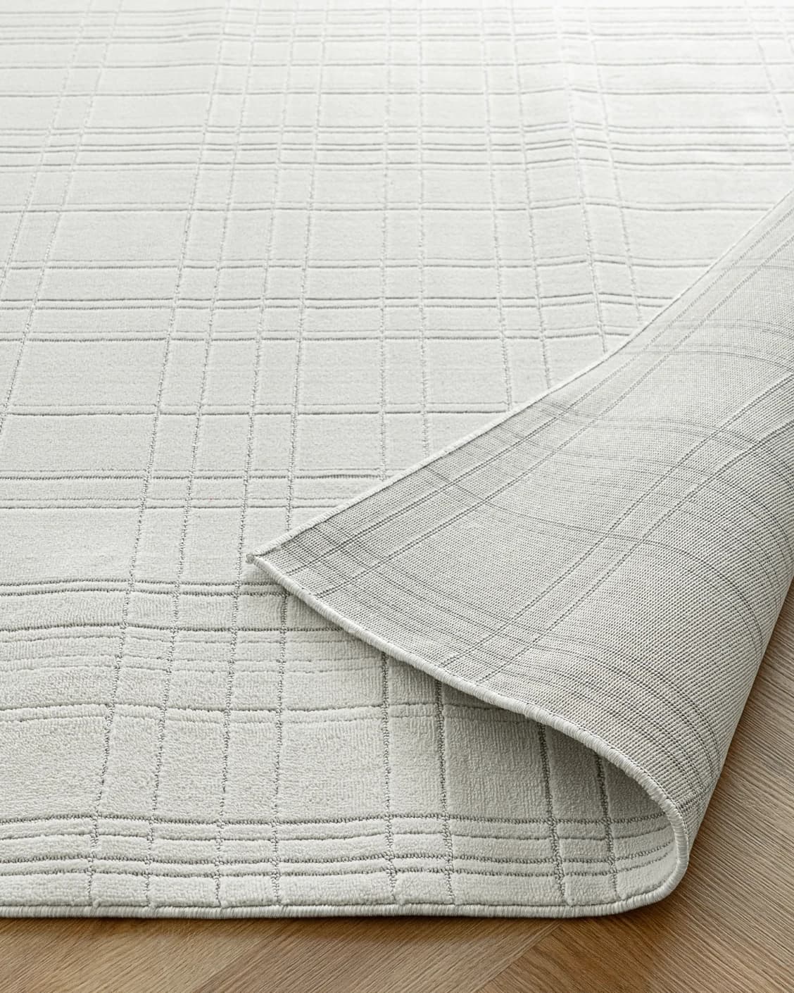 Corvin Sandy carpet in ivory and grey, shown in a product close-up as image 10
