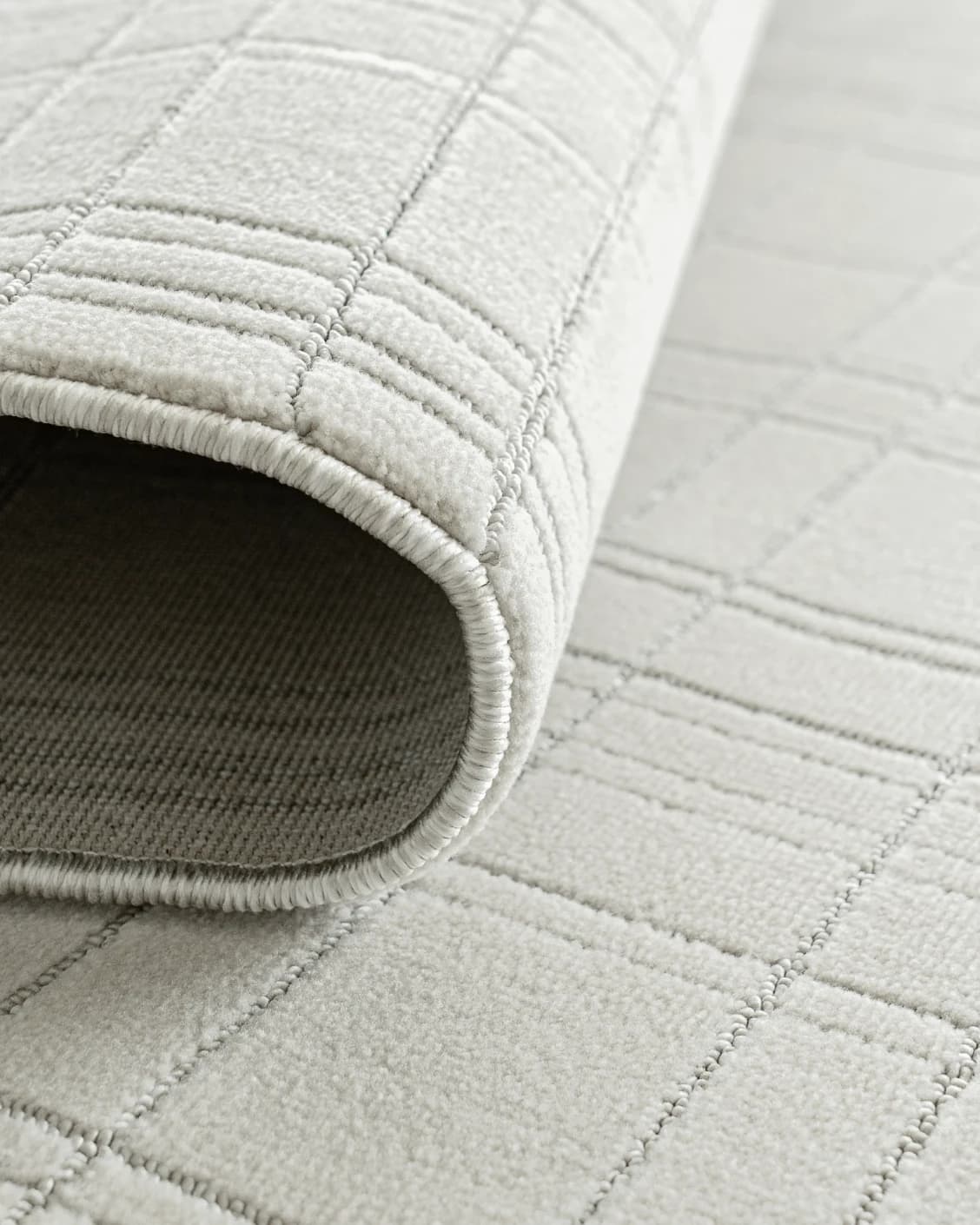 Corvin Sandy carpet in ivory and grey, shown in a product close-up as image 11