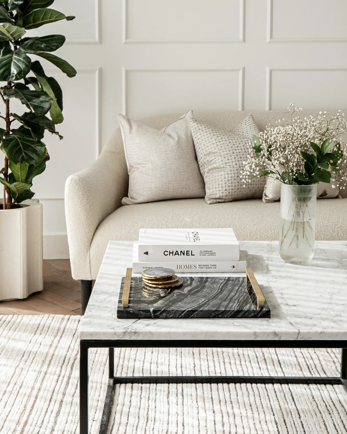 Daniel Bandiagara trays in gold and black, shown in a lifestyle front view as image 1