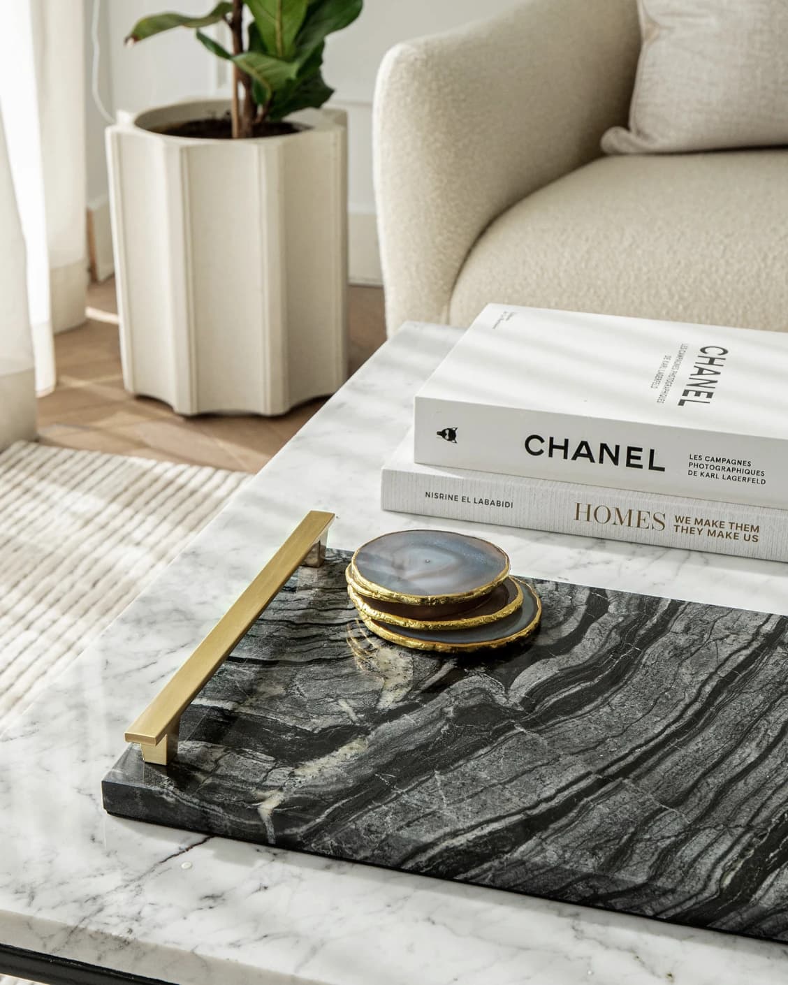 Daniel Bandiagara trays in gold and black, shown in a lifestyle top view as image 2