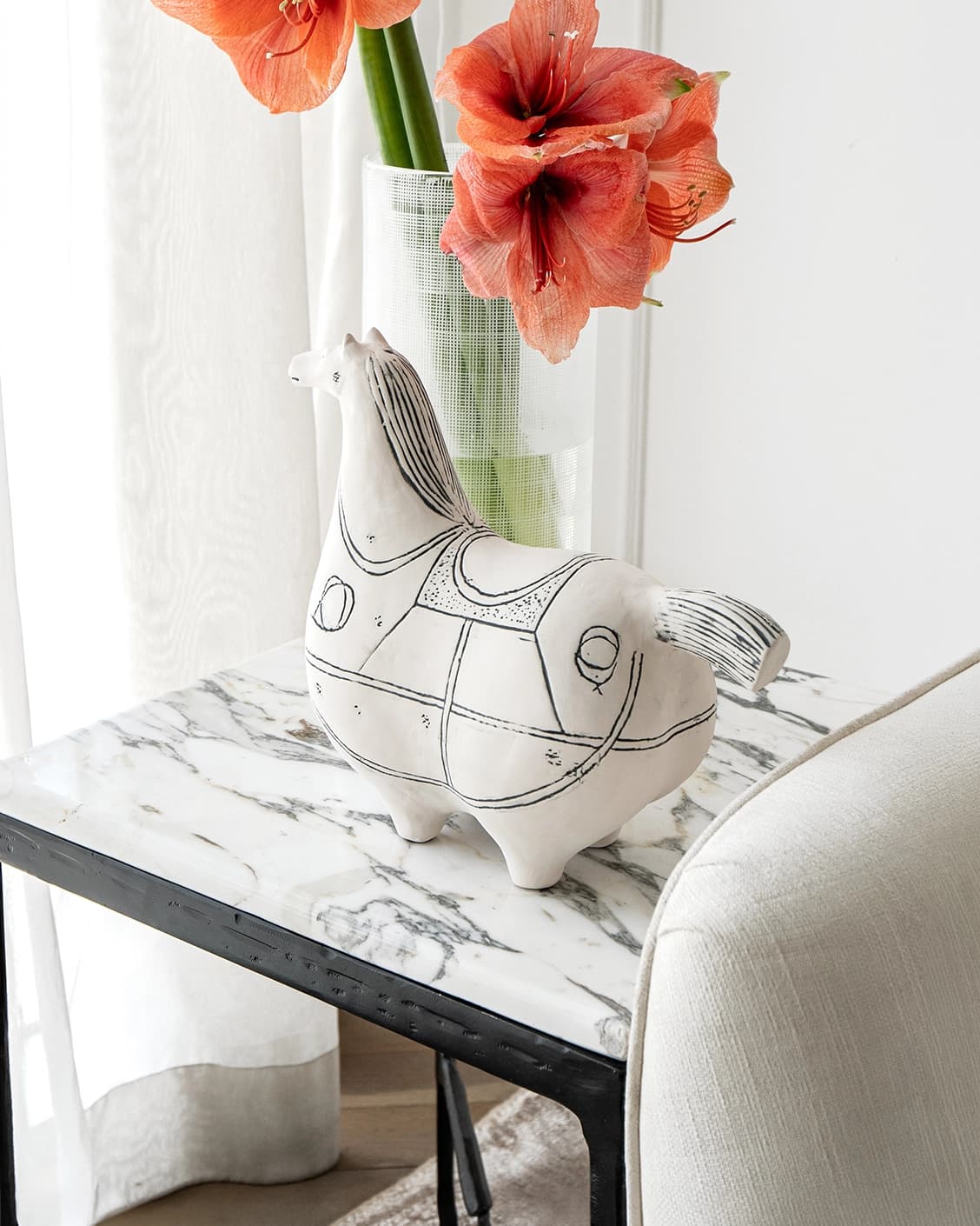 Danna Arneson statues and sculptures in black and white, shown in a lifestyle right view