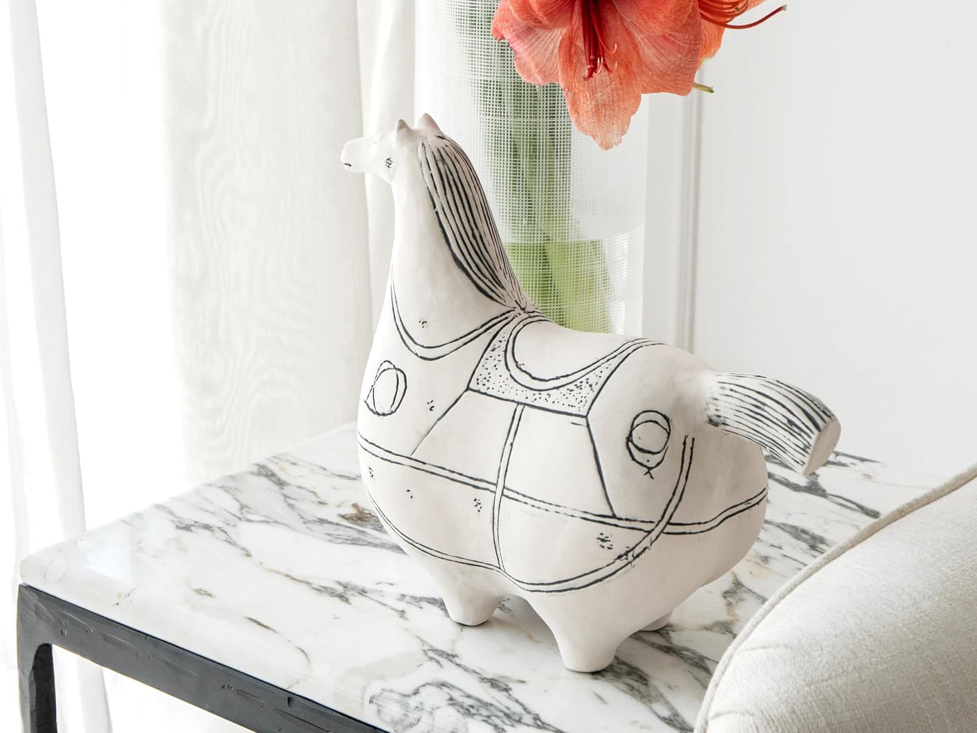 Danna Arneson statues and sculptures in black and white, shown in a lifestyle right view