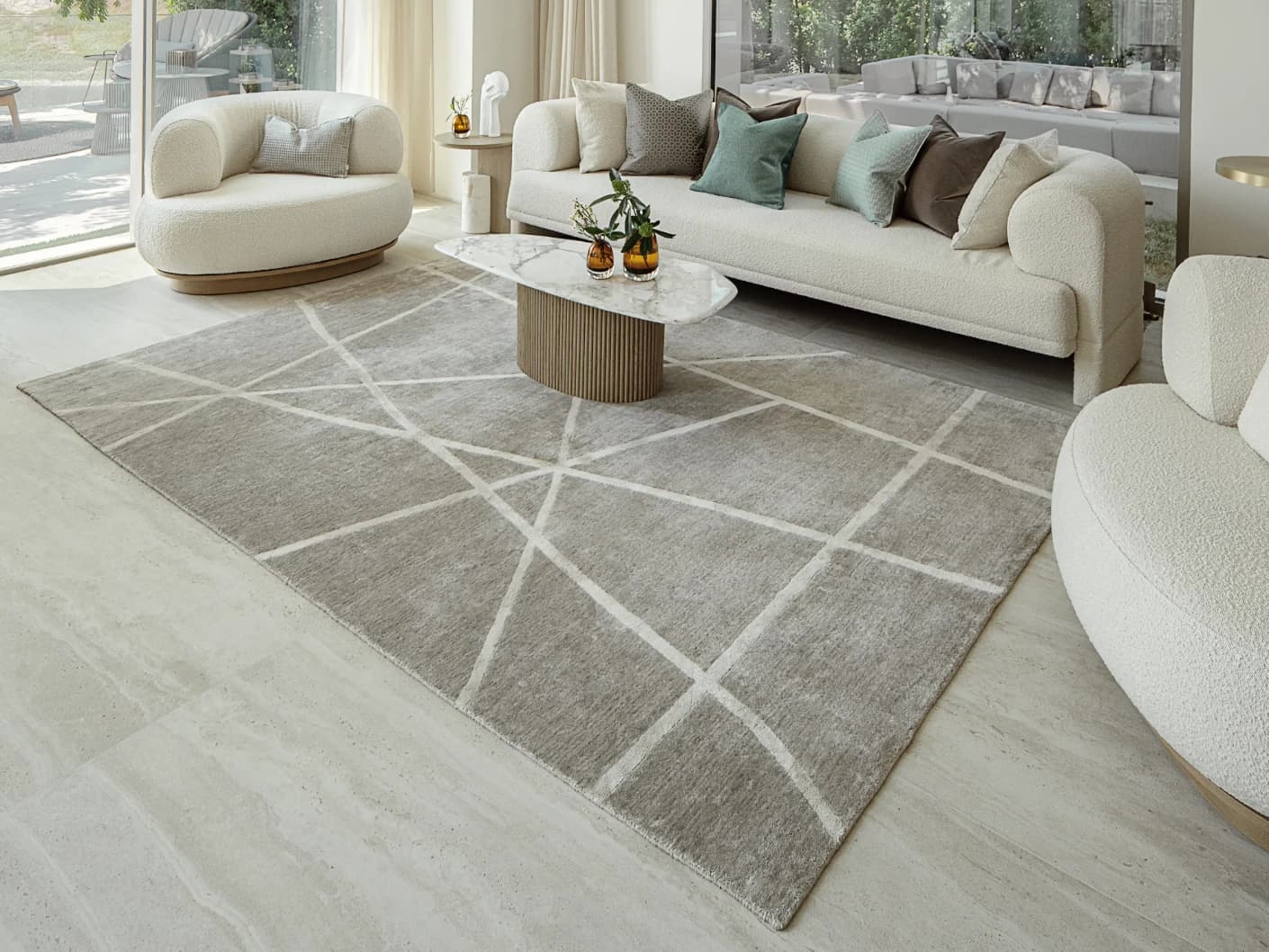 Dash Alba carpets in grey and ivory, shown in a lifestyle close-up top view as image 1