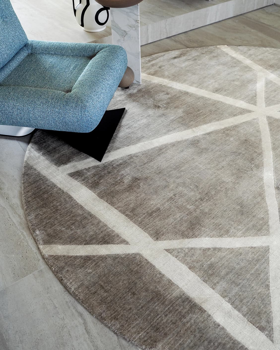 Dash Alba carpets in grey and ivory, shown in a lifestyle close-up top view as image 1