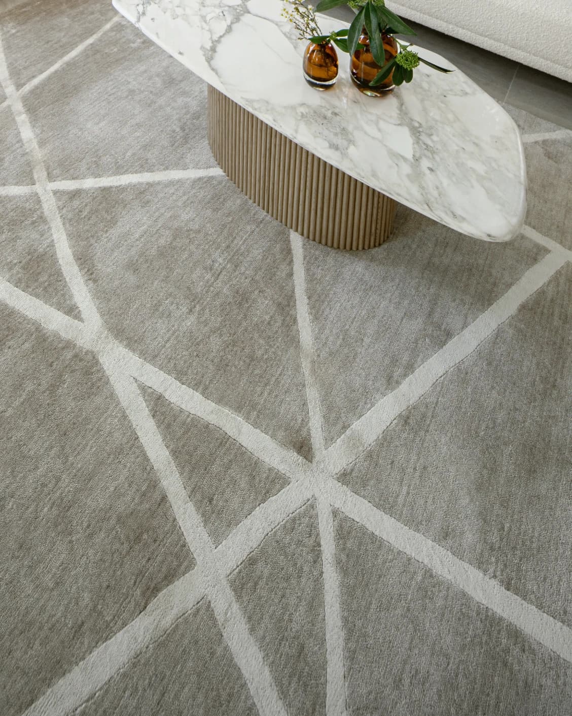 Dash Alba carpet in grey and ivory, shown in a lifestyle top view as image 10