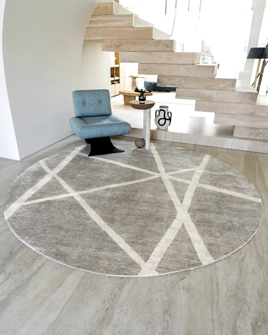 Dash Alba Round carpet in grey and ivory, shown in a lifestyle front view as image 2