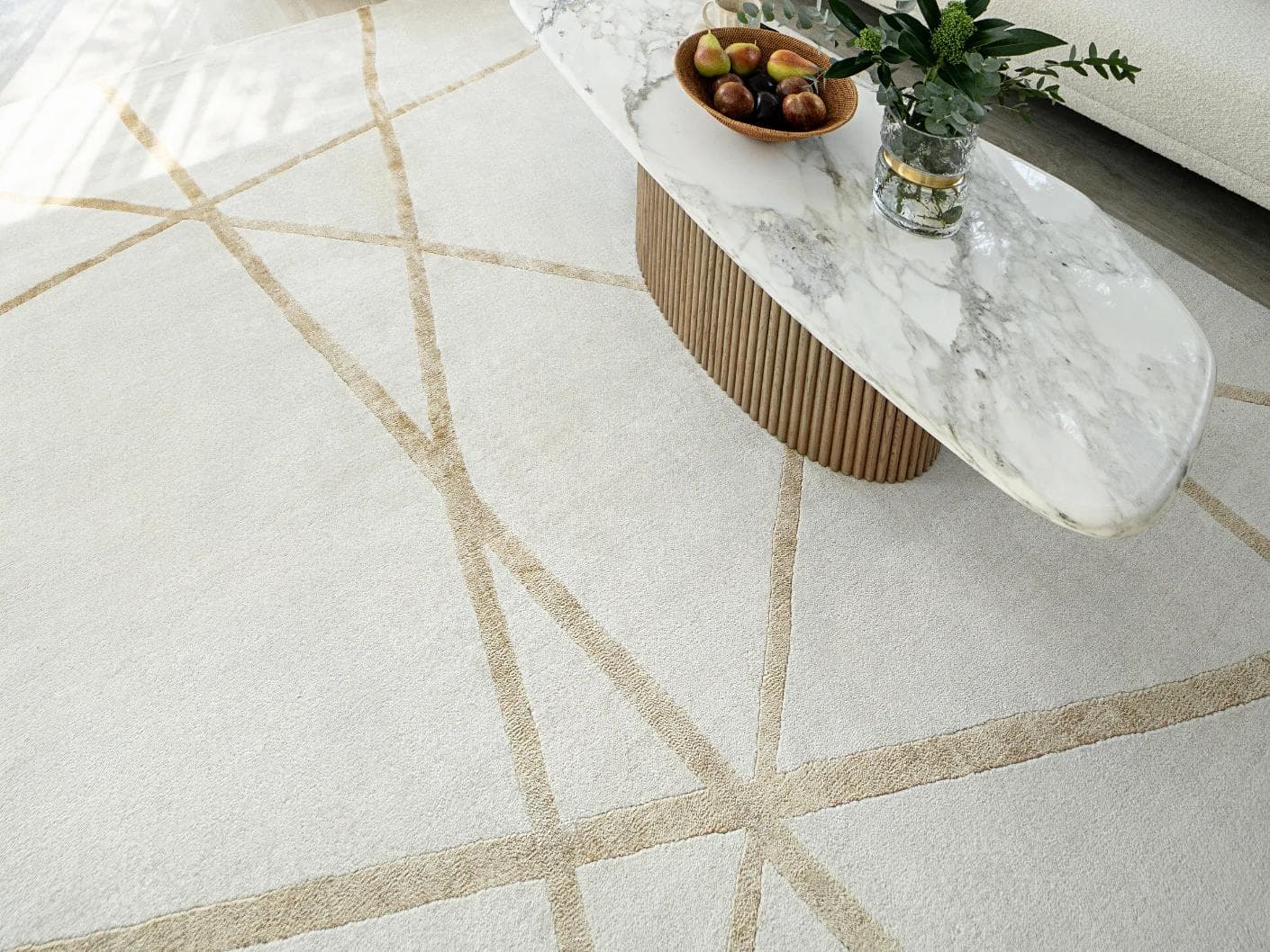 Dash Goldberg carpets in gold and off white, shown in a lifestyle close-up as image 2
