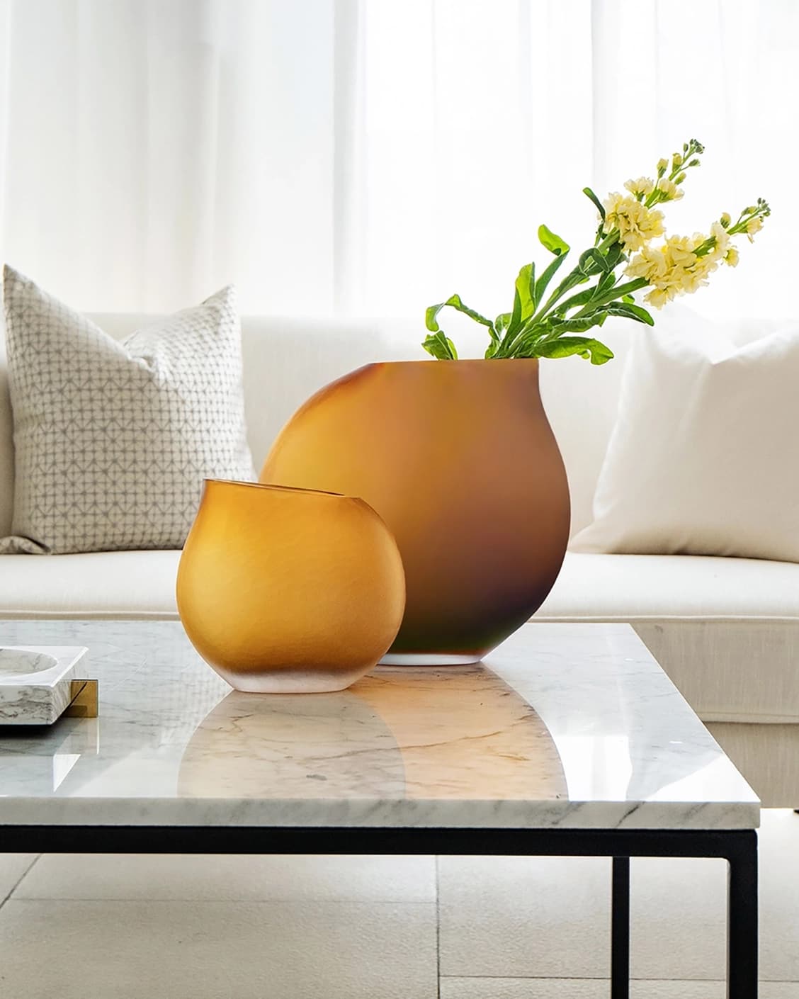 Denise Bundle vases in orange, shown in a lifestyle front view as image 1
