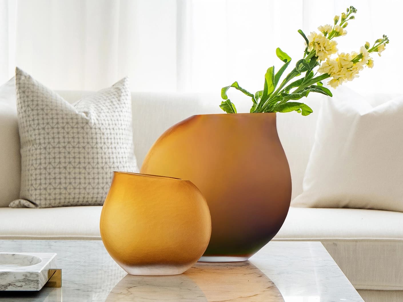 Denise Bundle vases in orange, shown in a lifestyle front view as image 1
