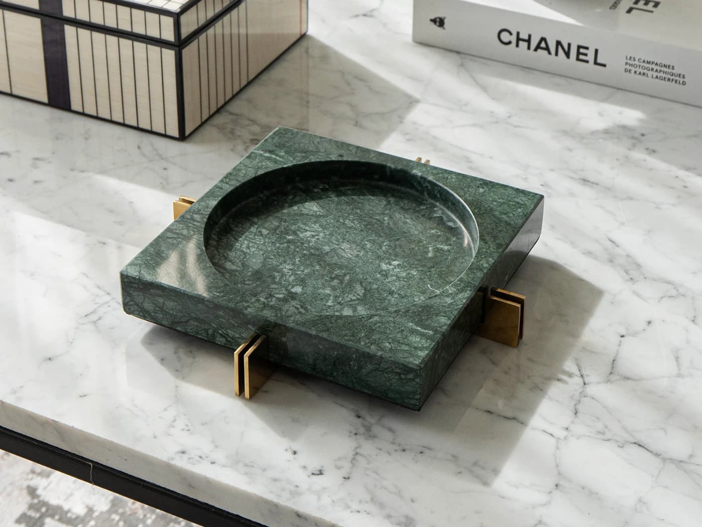 Dennis Bandiagara II trays in green and gold, shown in a lifestyle top view