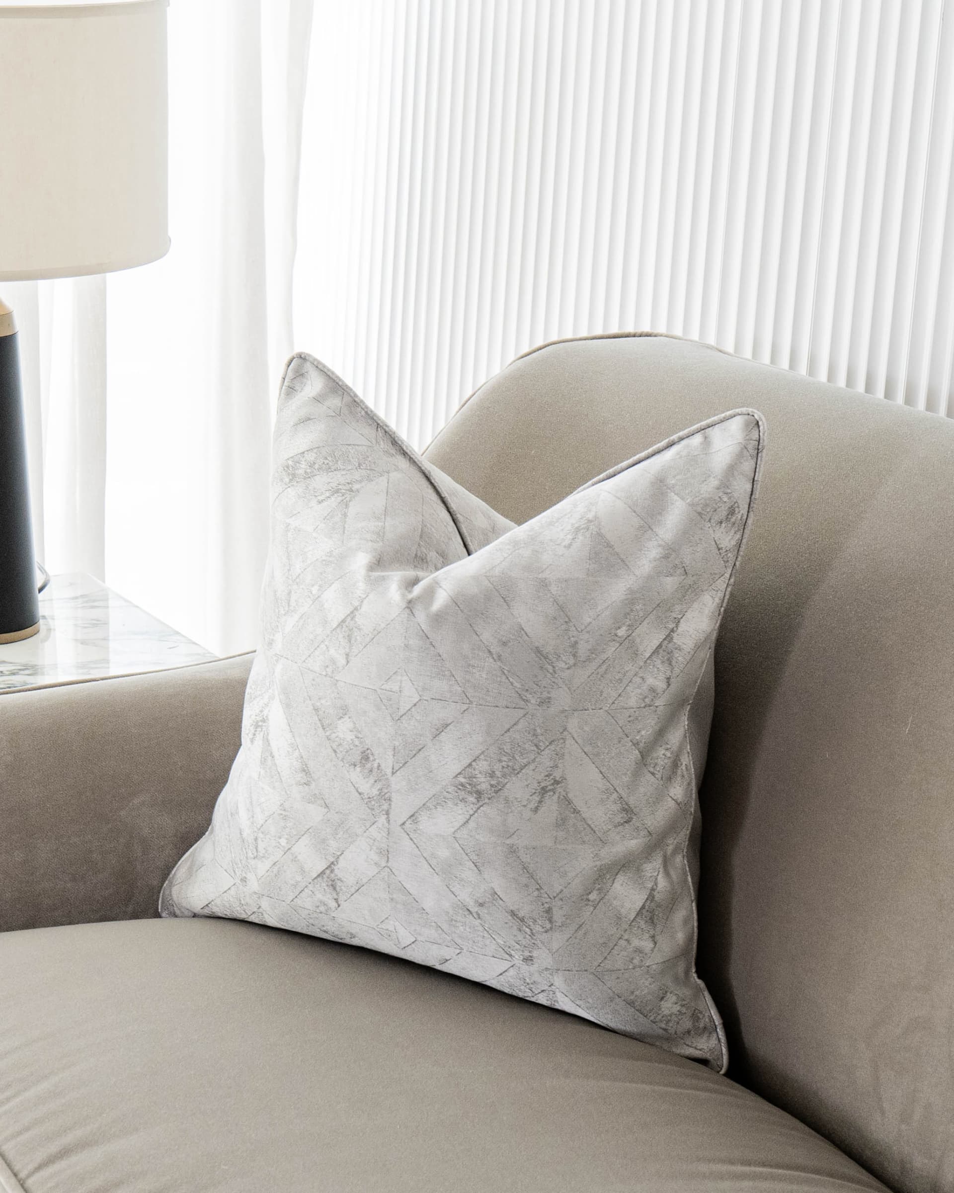 Diana Laurent cushion in silver, shown in a lifestyle right view as image 2