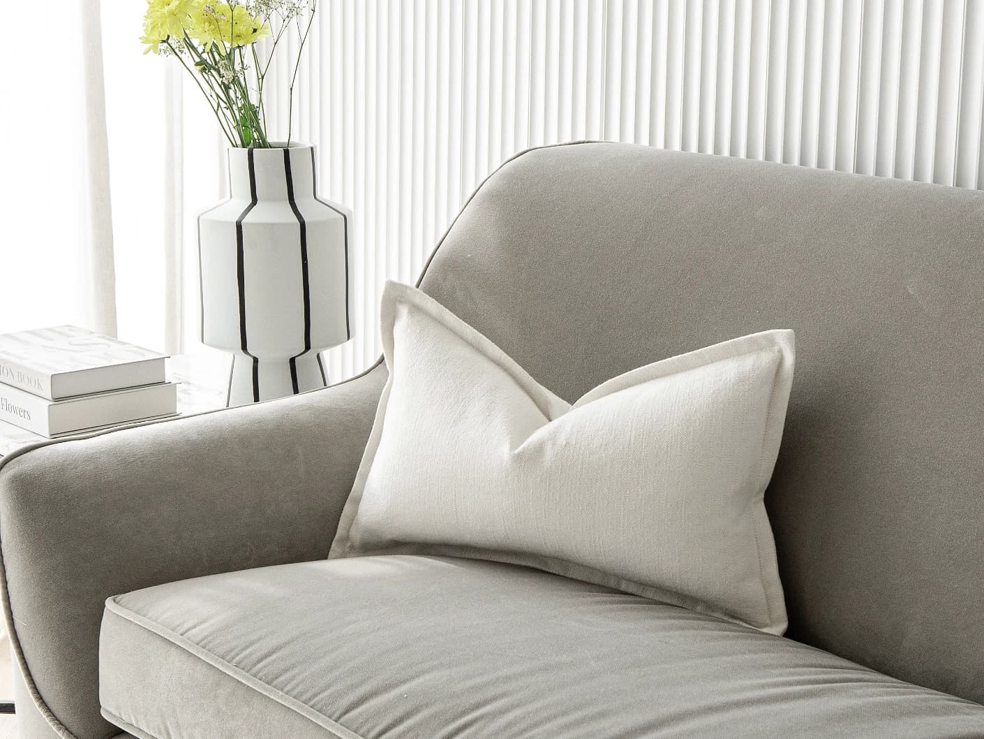 Dorothy Bianca II single cushions in white, shown in a lifestyle front view