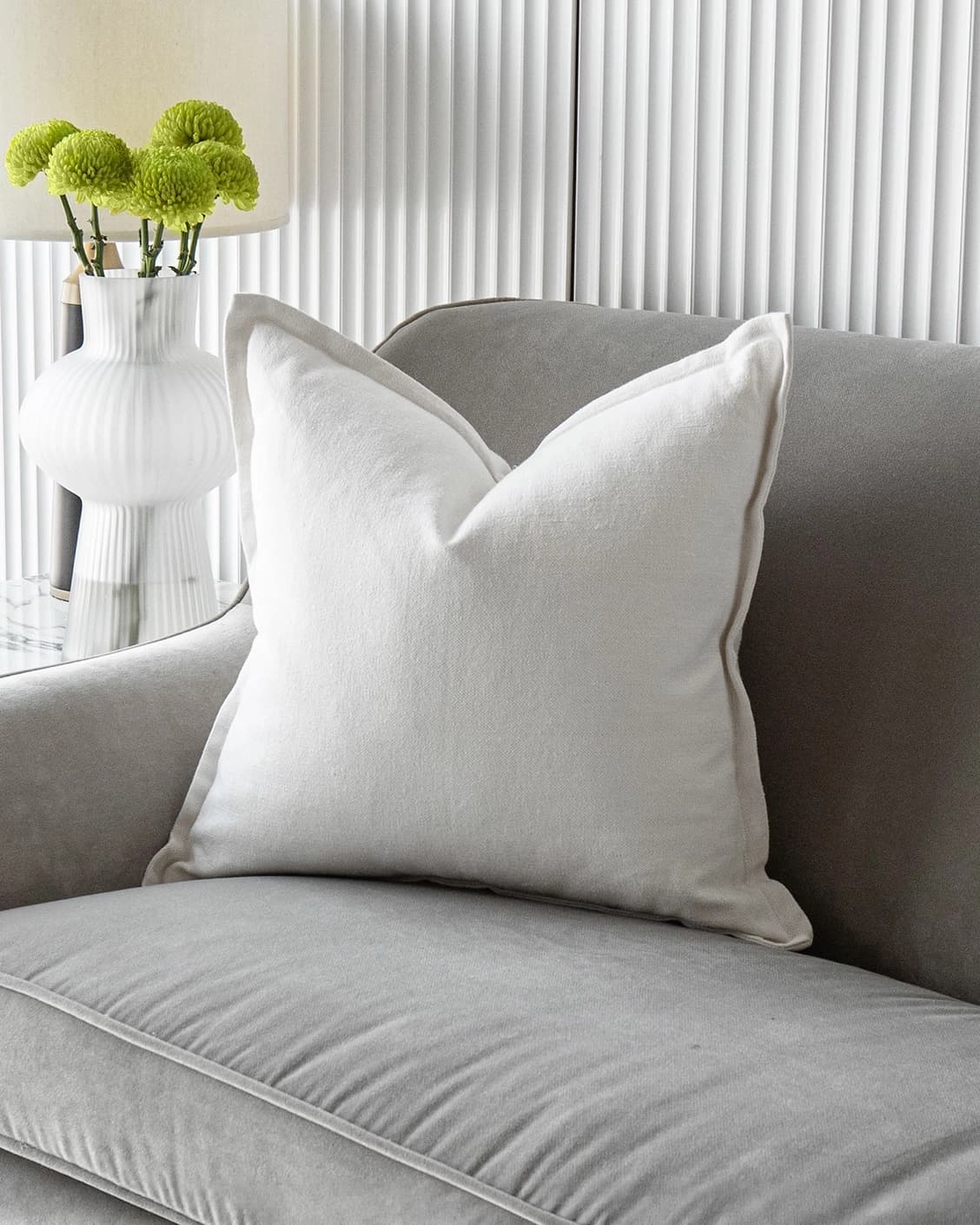Dorothy Bianca cushion in white, shown in a lifestyle front view as image 2