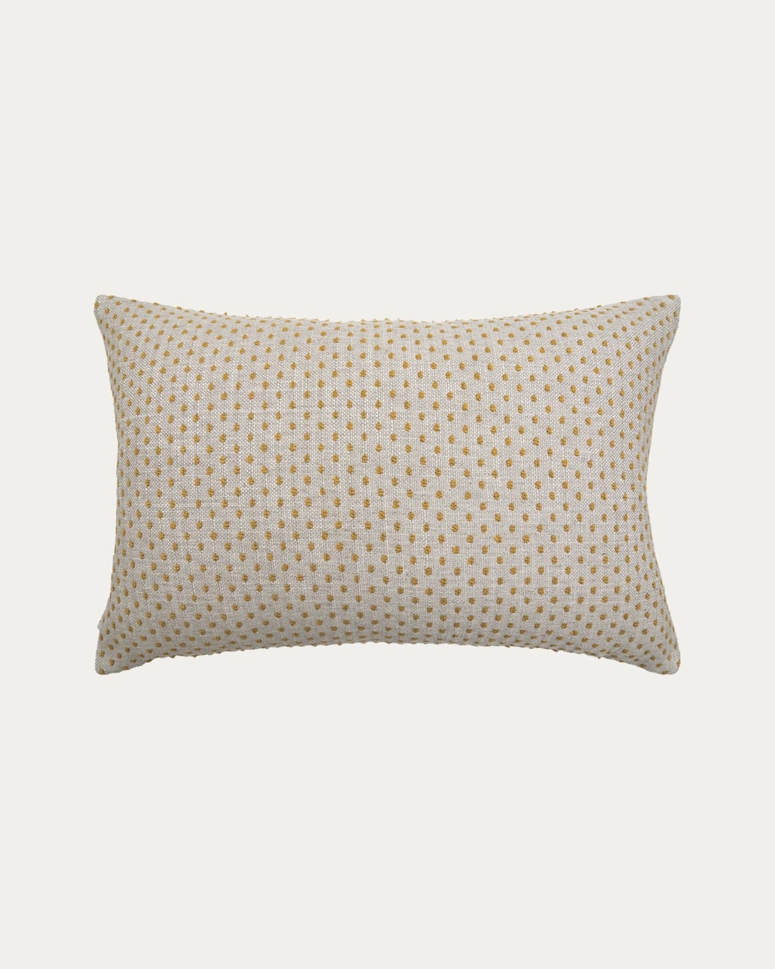 Dotty Barrymore III cushion in beige and grey, shown in a lifestyle left view as image 0