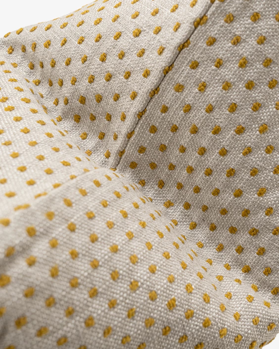 Dotty Barrymore III cushion in beige and grey, shown in a product top view as image 1