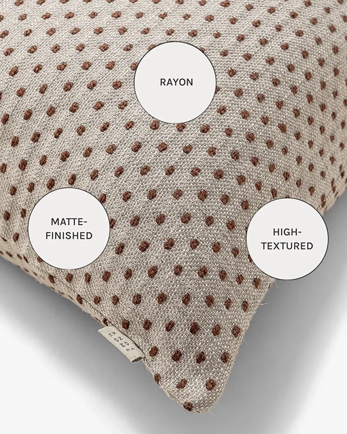 Dotty Rust cushions in rust and beige, shown in a product close-up as image 11