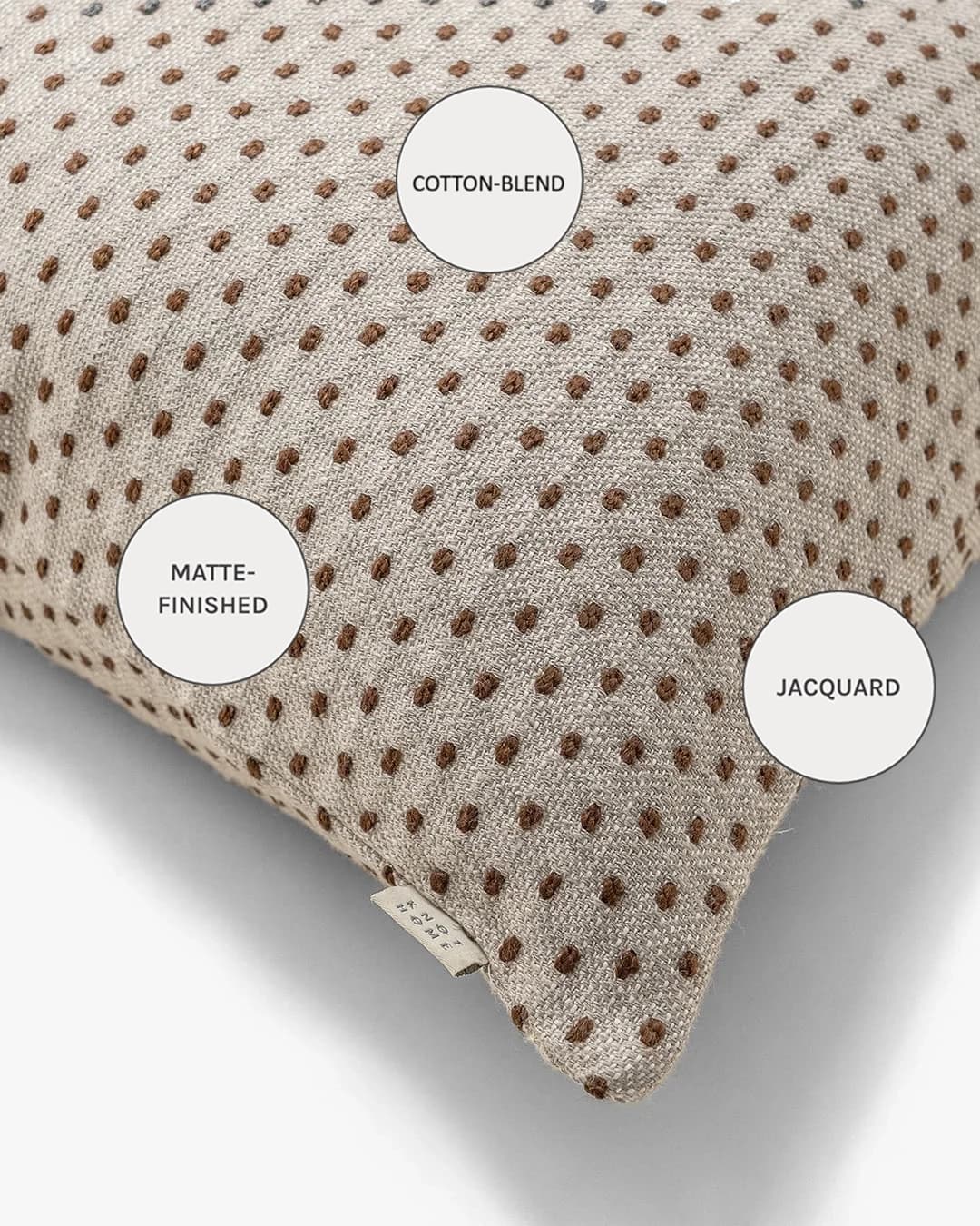 Dotty Rust III cushion in beige and grey, shown in a product right view as image 10