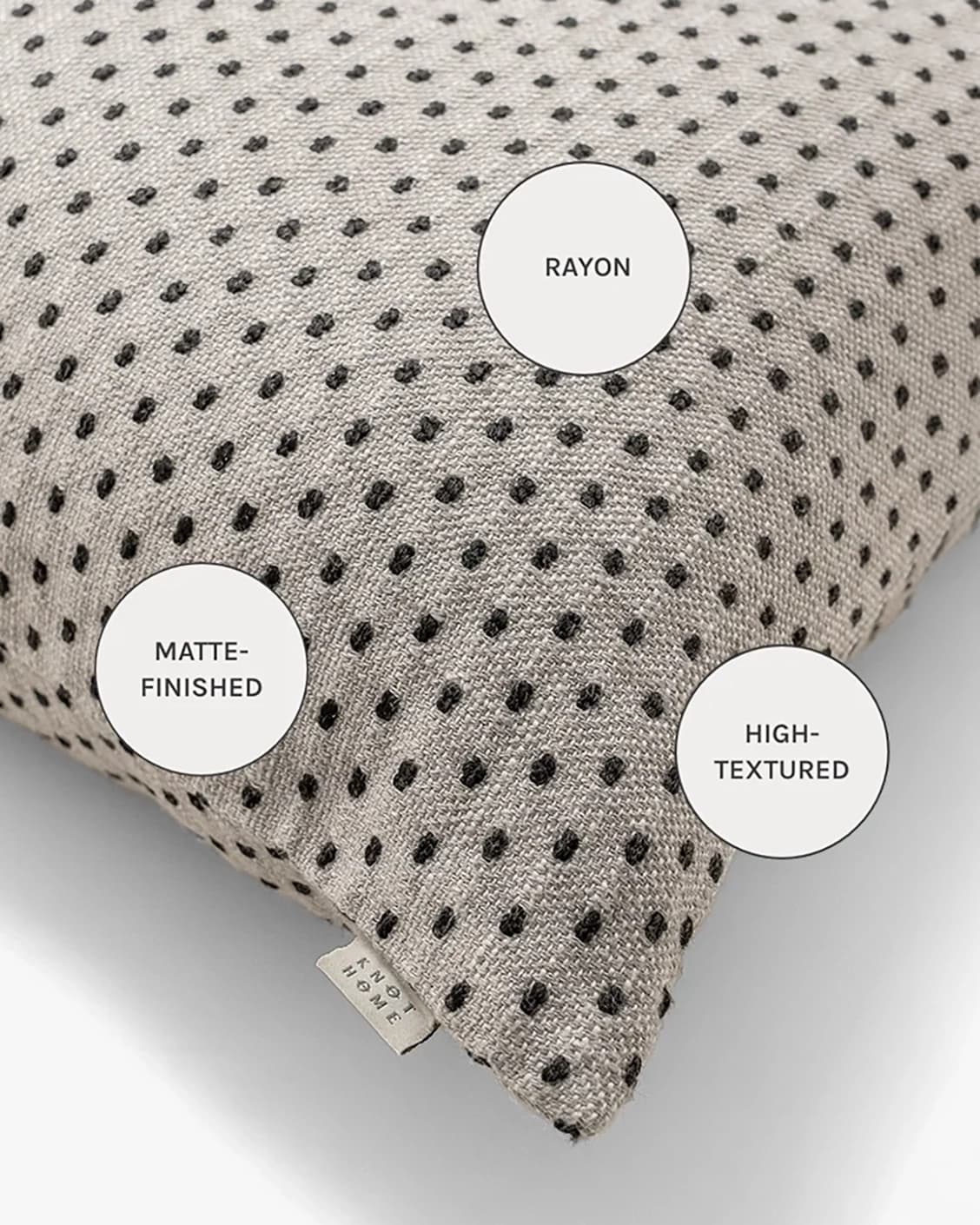 Dotty Steele cushions in grey, shown in a product close-up as image 12