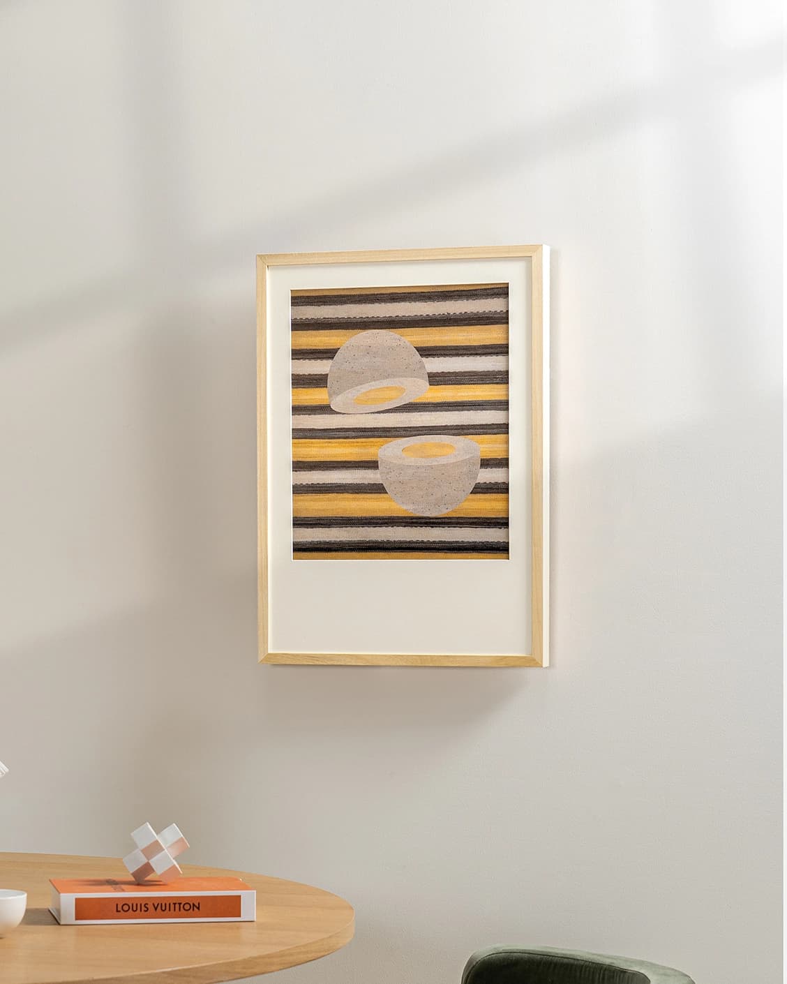 Eggsercise fine art print in yellow, brown and beige, shown in a lifestyle left view as image 4
