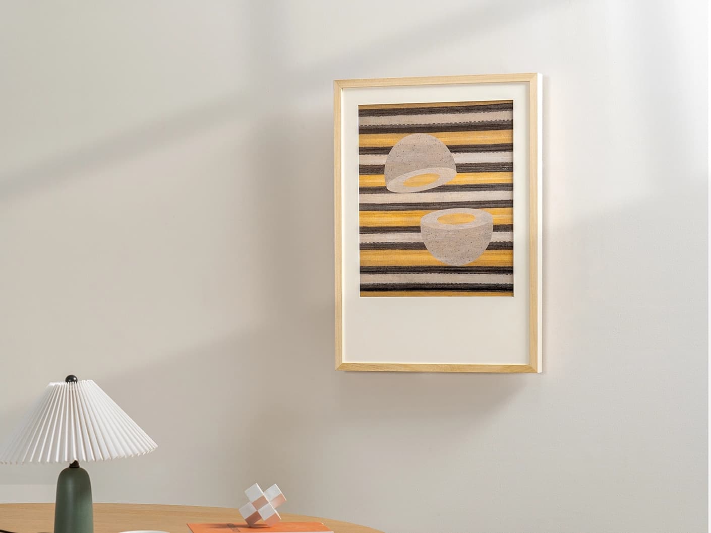 Eggsercise fine art print artwork in yellow, brown and beige, shown in a lifestyle left view