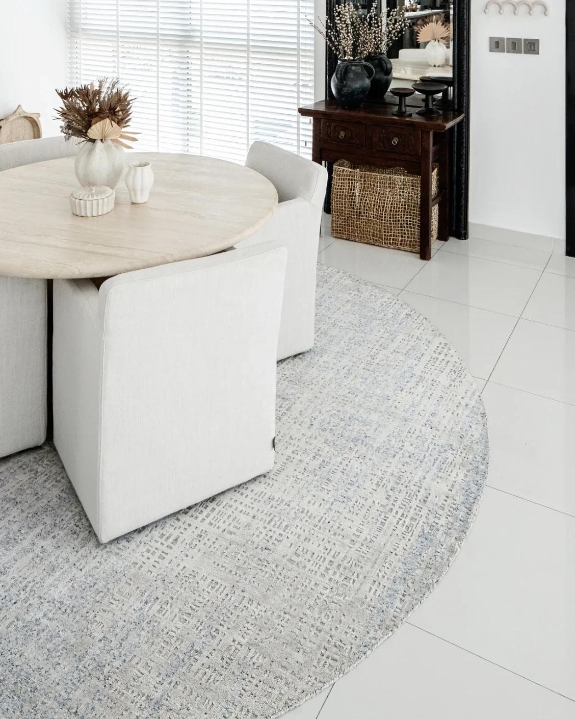 Eh Dillan Ocean Round carpet in blue, shown in a lifestyle right view as image 5