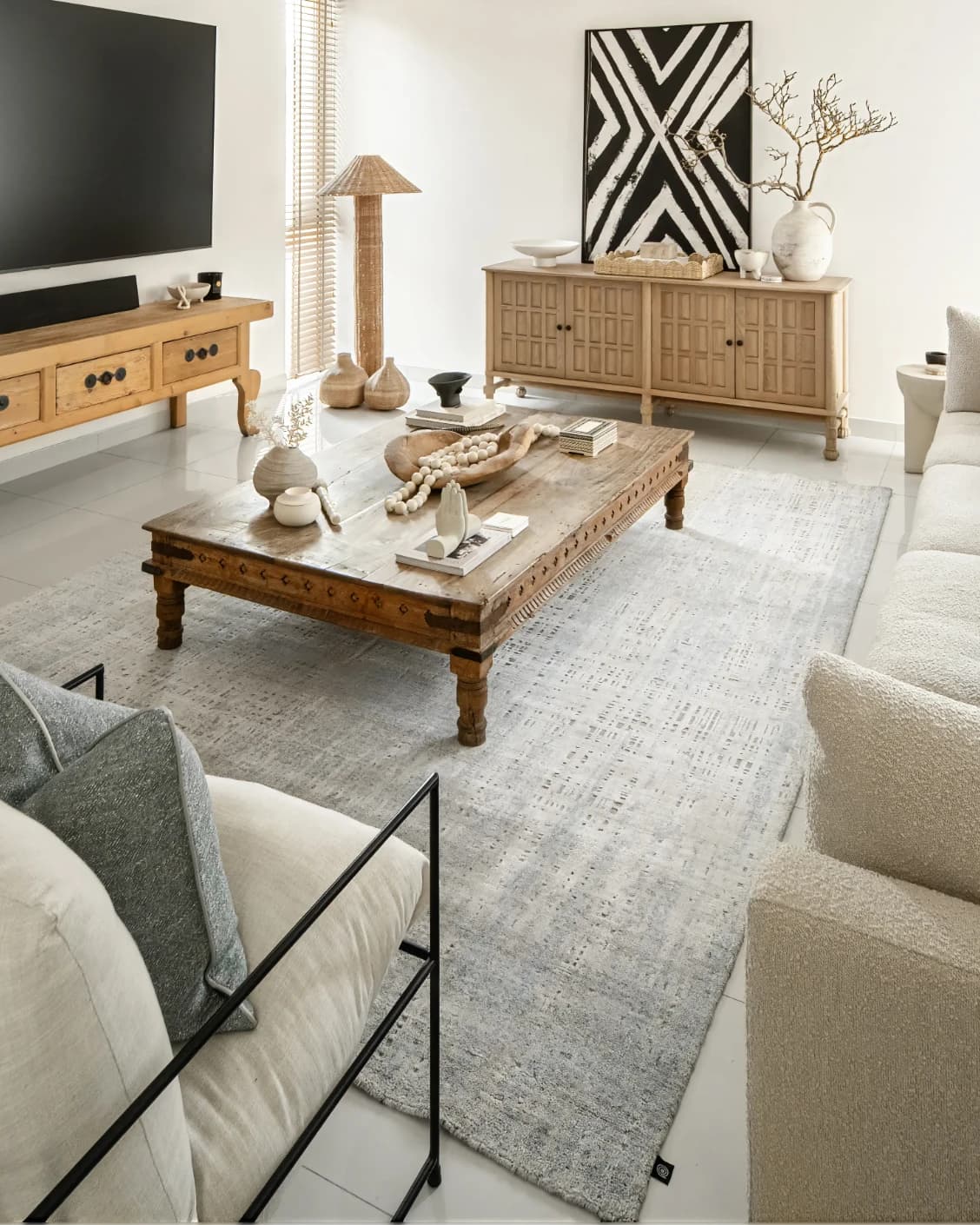 Eh Dillan Ocean carpet in blue, shown in a lifestyle right view as image 7