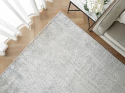 Eh Dillan Ocean carpet in blue, shown in a lifestyle front view