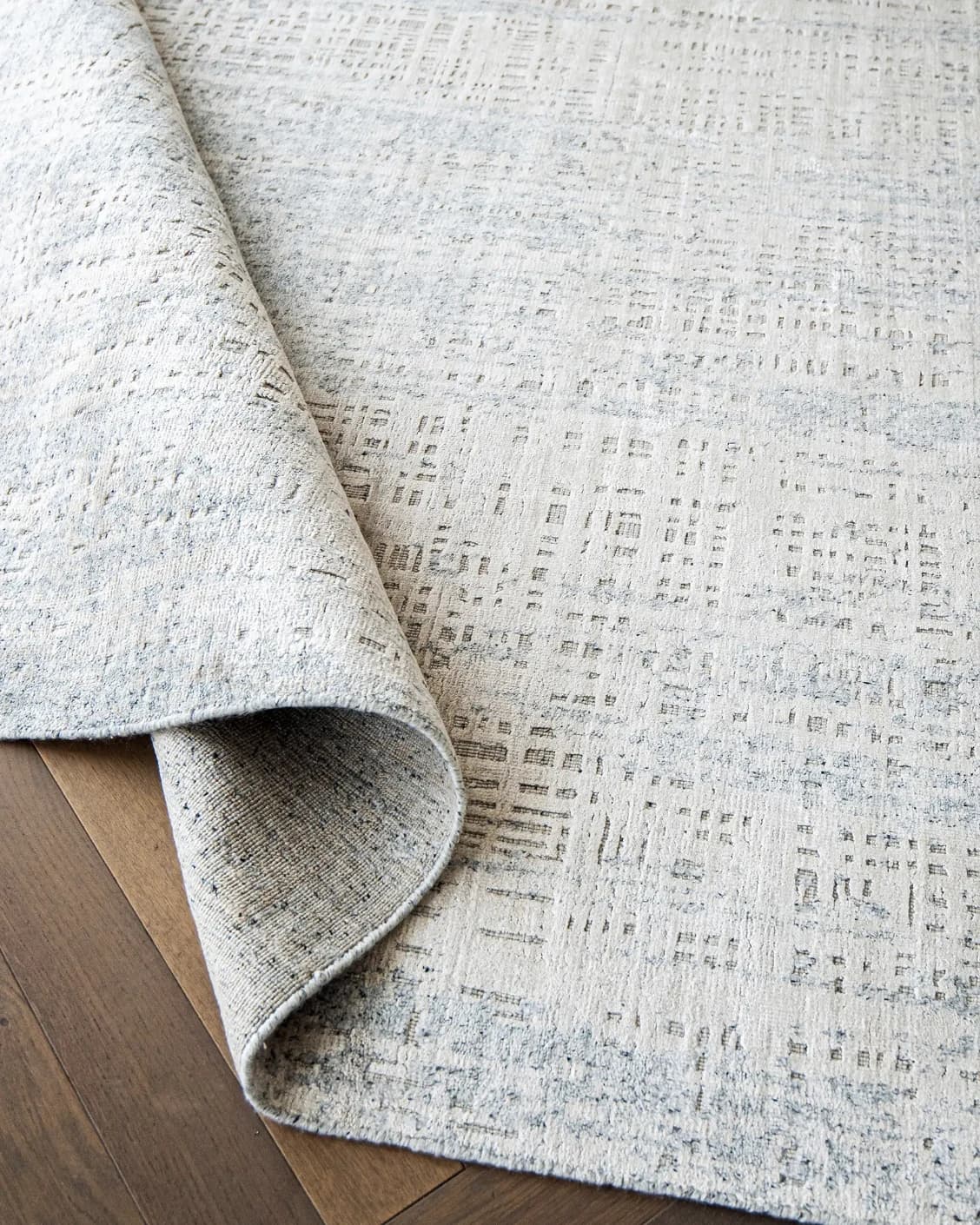 Eh Dillan Ocean carpet in blue, shown in a product top view as image 12