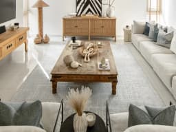 Eh Dillan Ocean carpet in blue, shown in a lifestyle front view