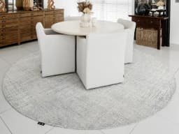 Eh Dillan Ocean Round carpet in blue, shown in a lifestyle front view