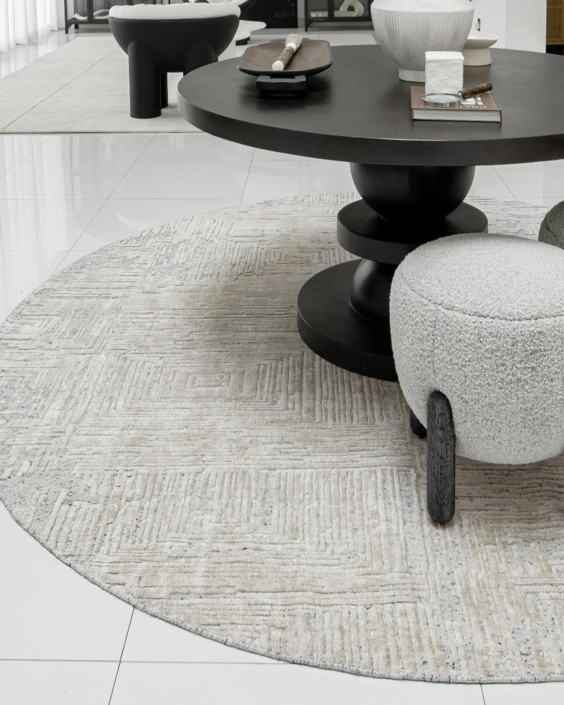 Eh Riley Stone Round carpet in beige, shown in a lifestyle left view as image 5