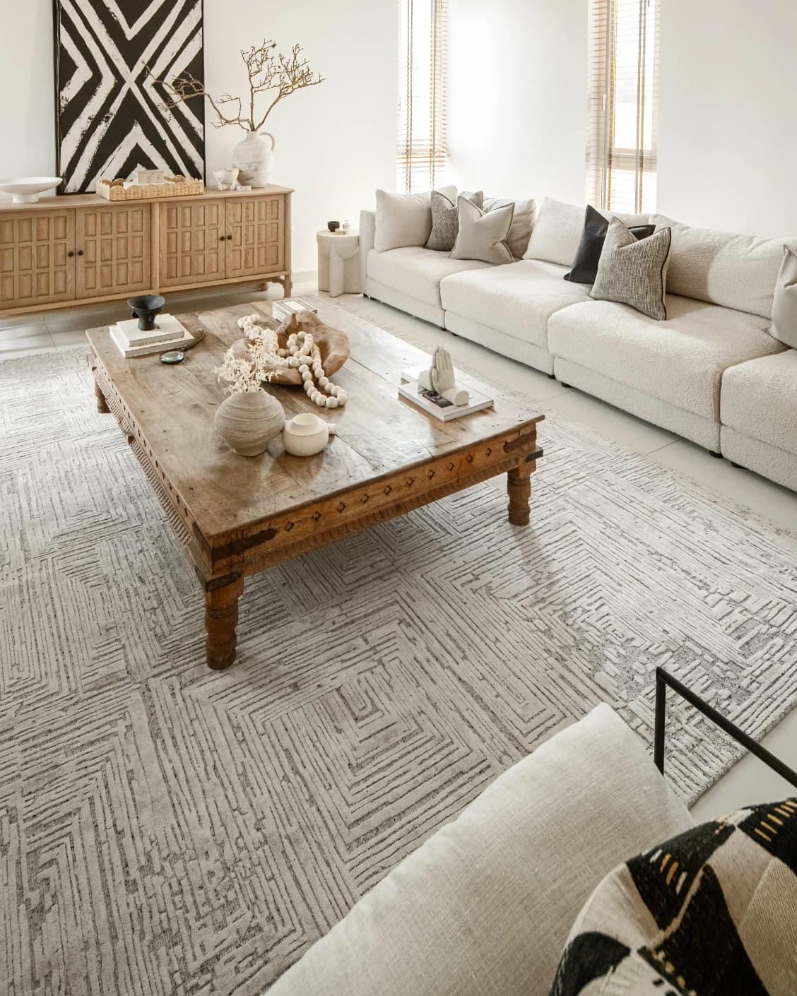 Eh Riley Stone carpet in beige, shown in a lifestyle left view as image 5