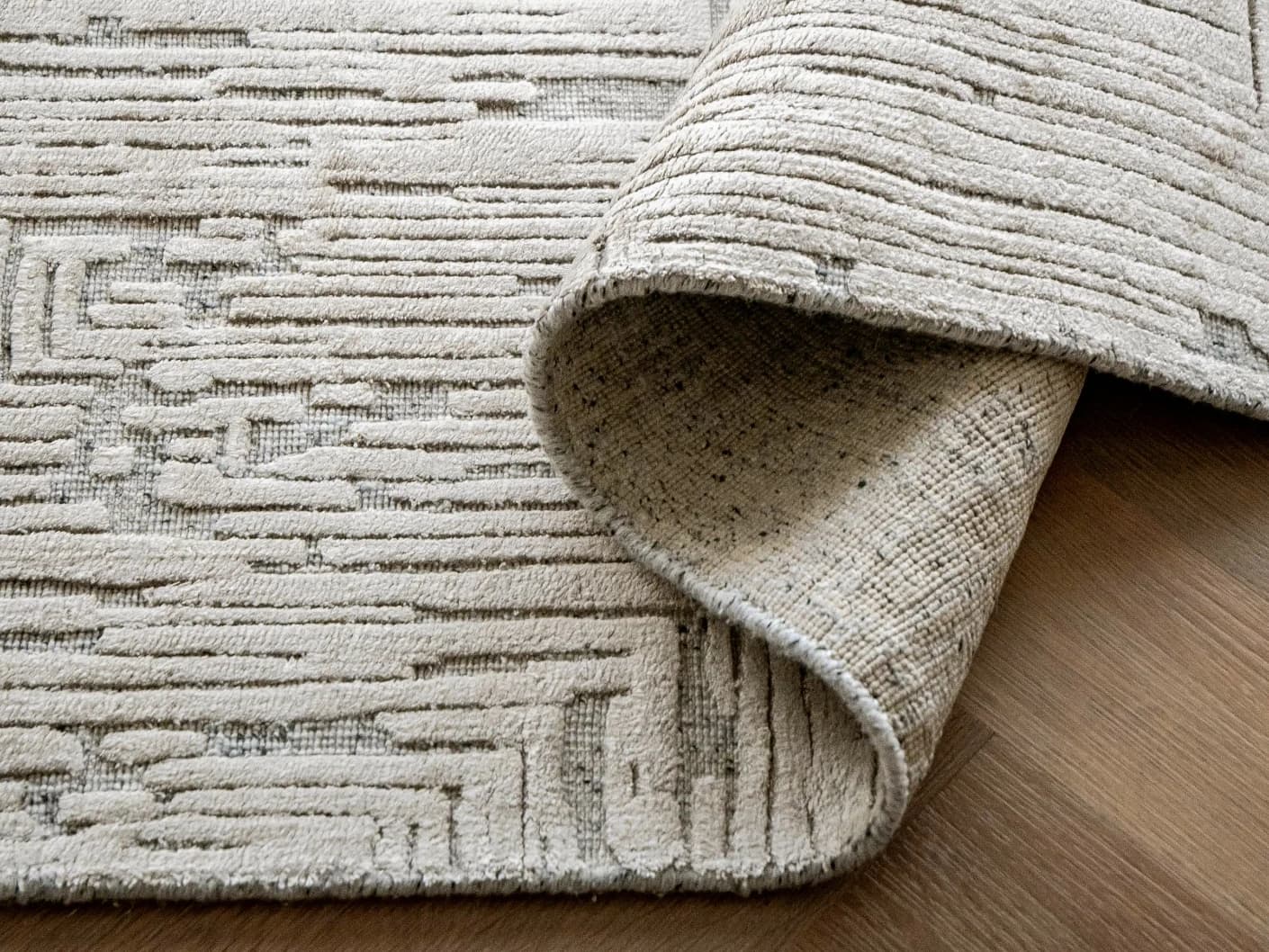 Eh Riley Stone carpets in stone and beige, shown in a product close-up view