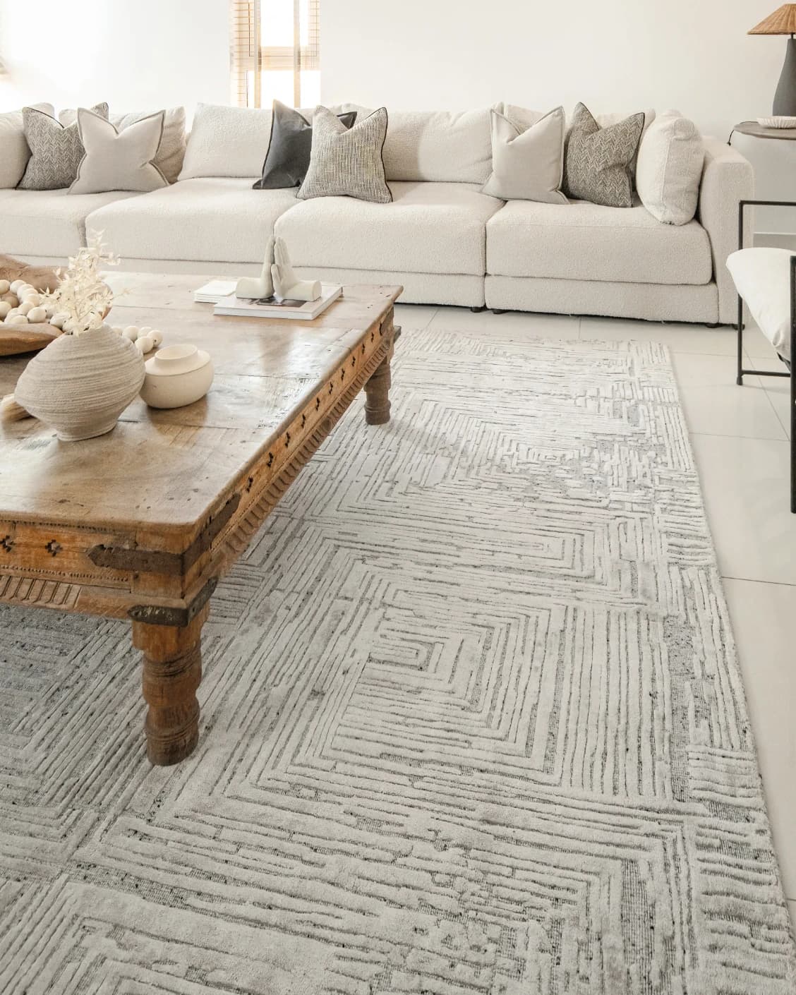 Eh Riley Stone carpet in beige, shown in a product right view as image 12