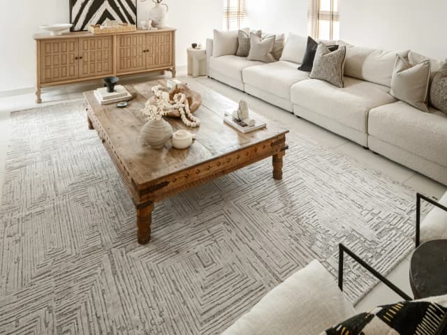 Eh Riley Stone Round carpet in beige, shown in a lifestyle close-up as image 4