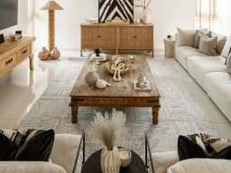 Eh Riley Stone carpet in stone and beige, shown in a lifestyle front view