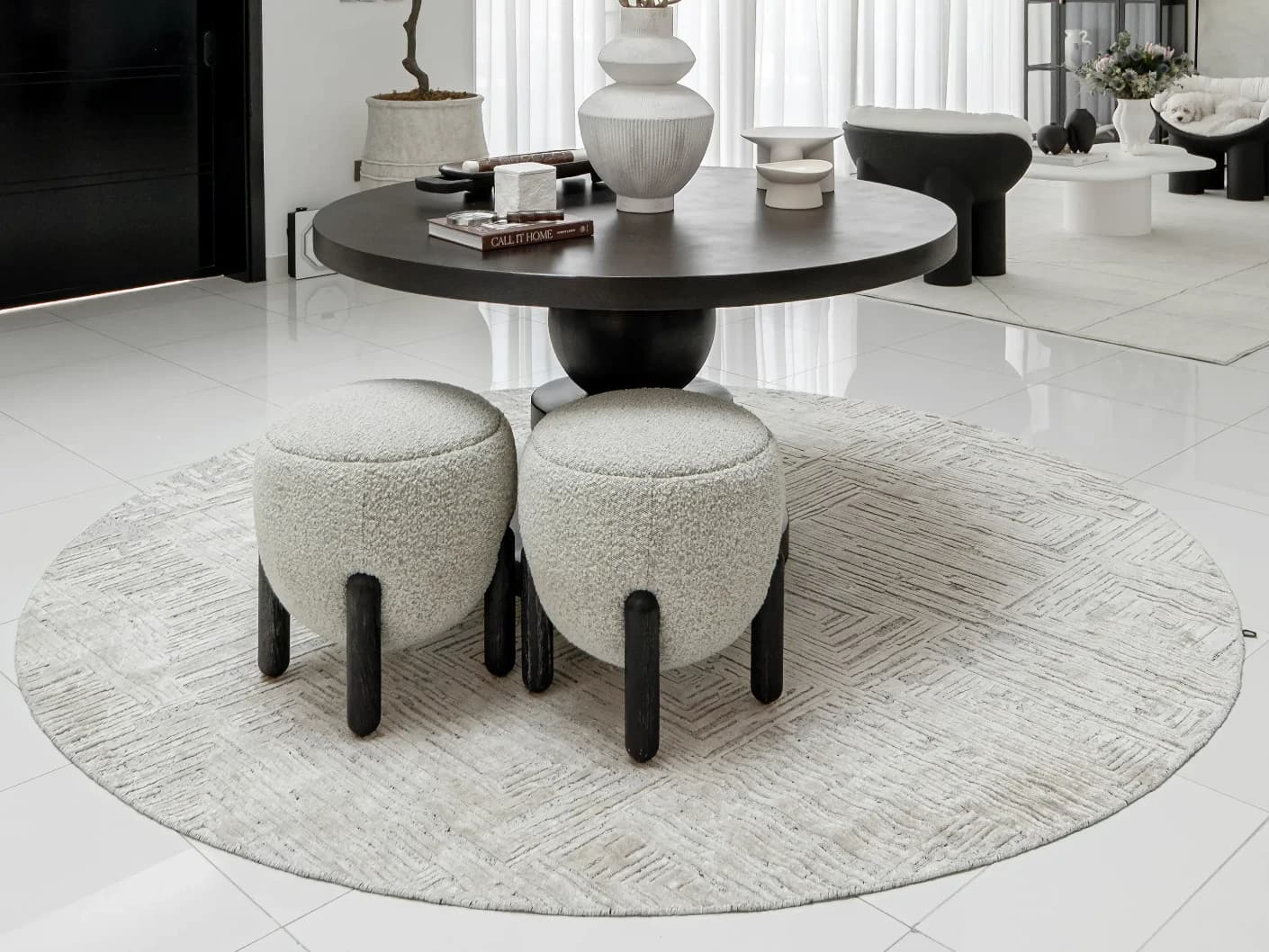 Eh Riley Stone Round carpet in beige, shown in a lifestyle front view