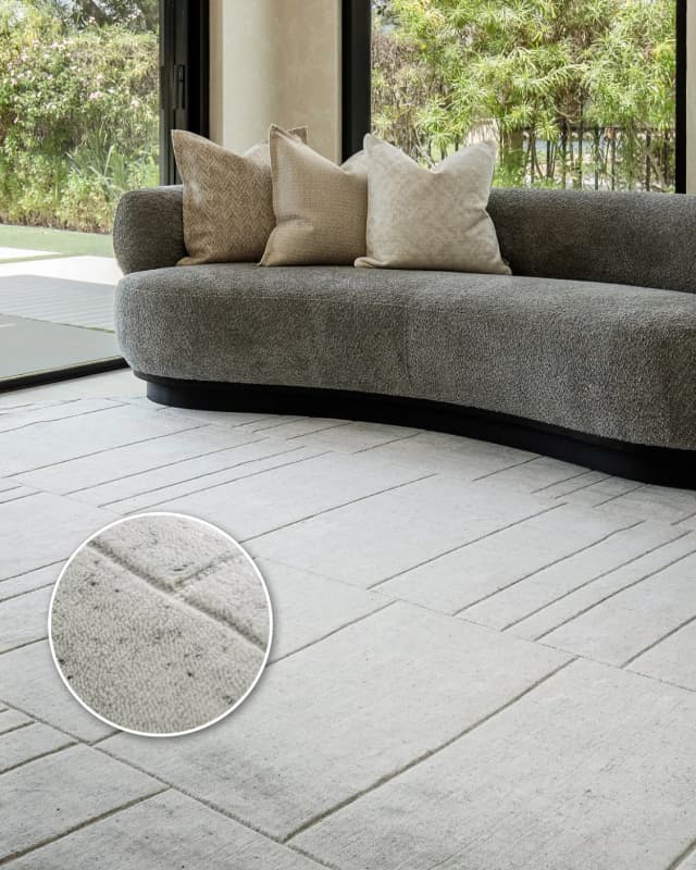 Elliot Alba Round carpet in grey and white, shown in a lifestyle front view as image 2