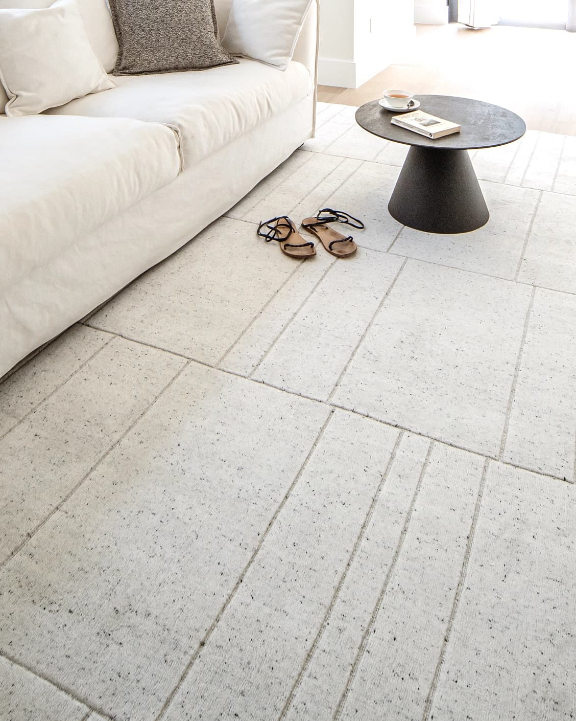 Elliot Alba carpet in grey and white, shown in a lifestyle close-up as image 4