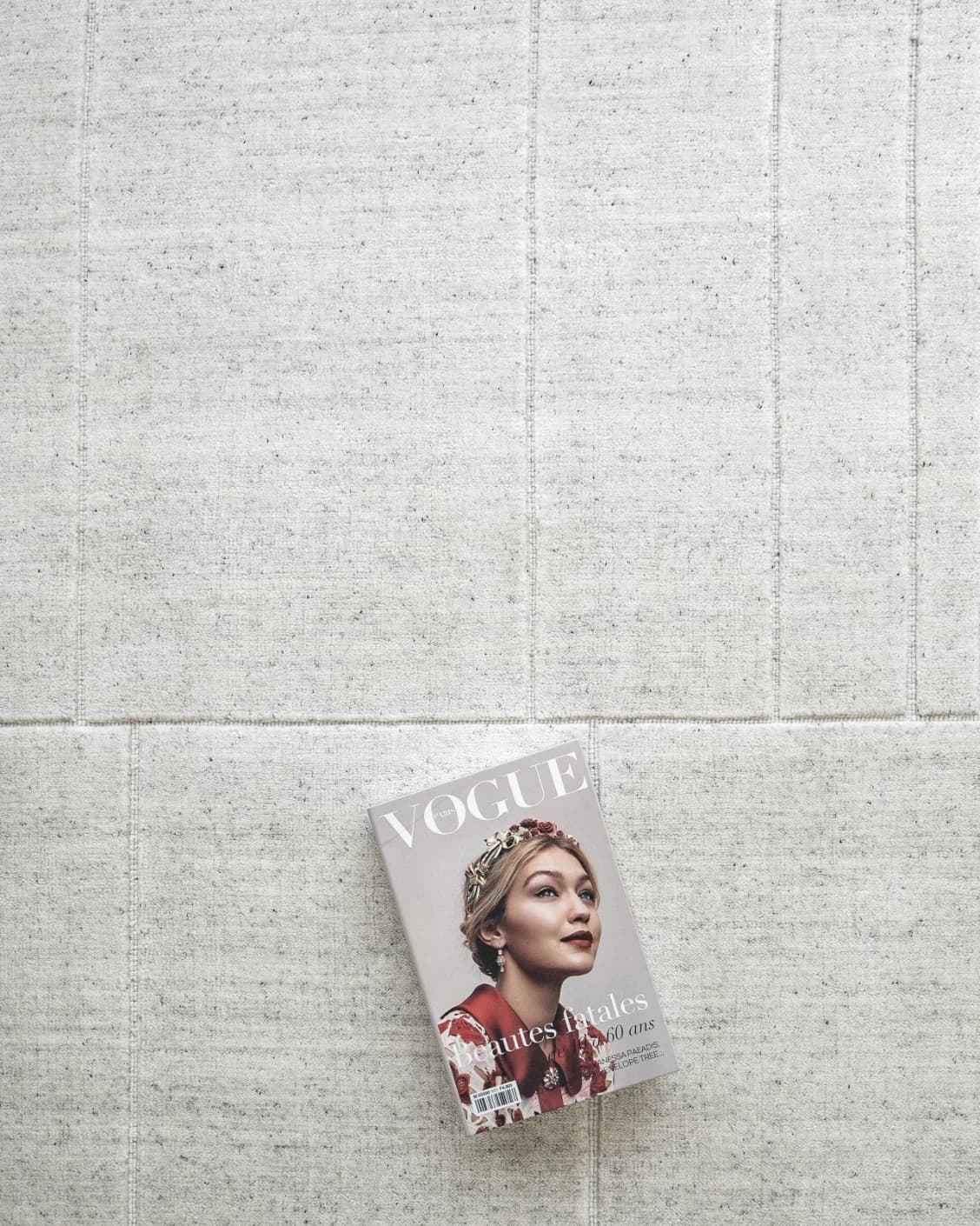 Elliot Alba carpet in grey and white, shown in a lifestyle top view as image 12
