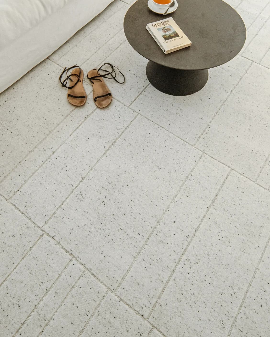 Elliot Alba carpet in grey and white, shown in a lifestyle top view as image 14