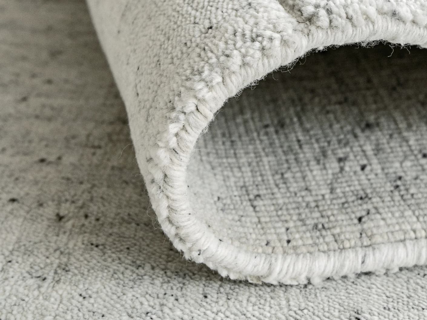 Elliot Alba carpets in grey and white, shown in a lifestyle front view as image 2