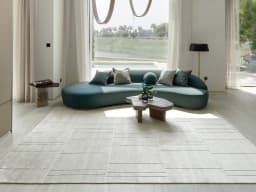 Elliot Ashton carpet in grey and silver, shown in a lifestyle front view